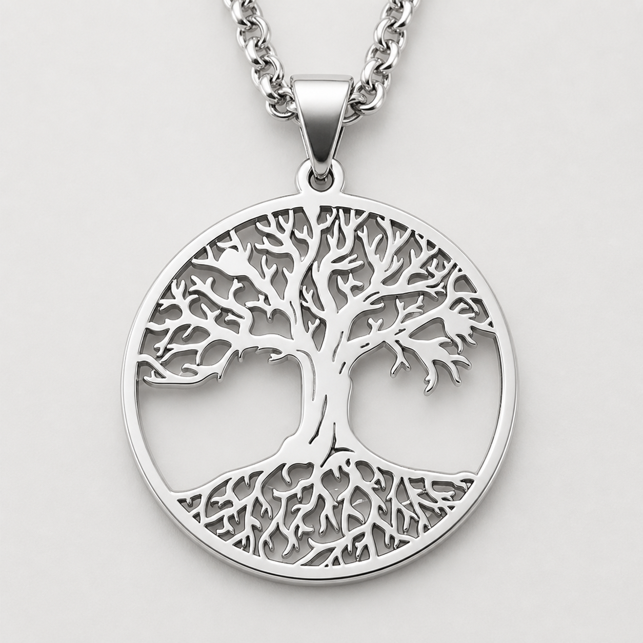 Pendentif Arbre de Vie ajouré en acier inoxydable avec racines visibles